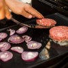 Load image into Gallery viewer, CAST IRON REVERSIBLE GRIDDLE FOR ROGUE® 425 / 625 AND FREESTYLE MODEL GRILLS
